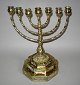 7 armed 
candlestick in 
brass / bronze, 
ca.1900. With 
octagonal foot 
with 
decorations in 
the form ...