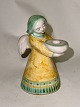 ANGEL IN A 
YELLOW DRESS: 
Figure of a 
painted angel 
in ceramic as a 
candle holder 
from the ...