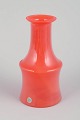 Swedish art 
glass
Mouth-blown 
vase, 1970s.
Mouth-blown 
vase in vivid 
orange glass 
with an ...