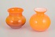 Swedish art 
glass
Two 
mouth-blown 
vases, 1970s.
Two 
mouth-blown 
vases in 
vibrant orange 
glass ...
