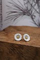 A pair of old 
Georg Jensen 
Marguerite / 
Daisy earrings 
with ear studs 
in sterling 
silver and ...