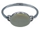 Niels Erik From 
sterling 
silver, modern 
armring with 
large white 
bone.
Hallmarked 
"N.E. FROM ...