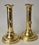Pair of Danish brass empire candlesticks, 19th century. Unmarked. H.: 19.5 cm.Appears freshly ...