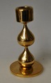 Asmussen drop 
candlestick, 
20th century. 
Middelfart. 
Denmark. Gilded 
brass. Stamped. 
Height: 12 ...