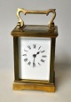 French travel 
clock in brass, 
19th century. 
With glass. 
Enamel dial 
with Roman 
numerals, black 
...
