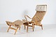 Bruno Mathsson 
(1907-1988)
Pernilla 2 
easy chair with 
foot stool
Made of beech 
plywood ...