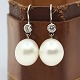 Heinitz Leth; 
Pair of 
southsea pearl 
earrings in 14k 
white gold set 
with diamonds. 
total 0.54 ...