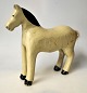 Old Danish 
painted wooden 
horse, early 
20th century. 
L: 20 cm. H.: 
20 cm.
