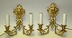 French wall lamps in bronze, 19th century. Each with two arms decorated with dragons. Shield ...