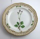 Royal 
Copenhagen 
Flora Danica. 
Lunch plate 
with open-work 
border. Design 
# 3554. 
Diameter 23 cm. 
...