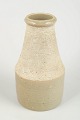 Hertha Bengtson 
for Rörstrand
Vase, 1970s.
Cylindrical 
stoneware vase 
combining 
glazed and ...
