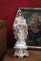 Decorative, old 
Madonna 
figurine in 
porcelain of 
the Virgin Mary 
with the baby 
Jesus. Height: 
22cm.