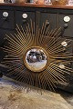Large French 
sun mirror from 
the 50s. in 
gold metal with 
...