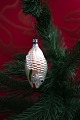 Old Christmas 
tree ornament 
in the shape of 
a small glass 
fish from 1940. 
Length: 7cm.