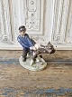 Royal 
Copenhagen 
figurine - Boy 
with calf 
No. 772, 1st 
grade
Height 17.5 
cm.
Design: ...