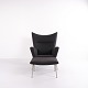 CH445 Wingchair 
designed by 
Hans J. Wegner 
and produced by 
Carl Hansen & 
Søn. 
Upholstered in 
...