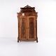 Antique 
mahogany 
cabinet from 
the 1880s with 
decorative 
carvings. 
Features doors 
and interior 
...