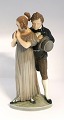 Royal 
Copenhagen. 
Porcelain 
figurine. Man & 
Woman. Model # 
1680. Height 26 
cm. (1 quality)