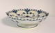 Royal 
Copenhagen. 
Blue fluted, 
full lace. 
Small round 
bowl on foot. 
Model 1023. 
Height 6 cm. 
...