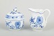 Meissen Blue Onion pattern sugar bowl and cream jug, mid-20th century.A charming set ...