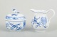 Meissen Blue Onion sugar bowl and creamer, mid-20th century.A set consisting of a classic ...