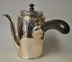 Martin Hinrich 
Petersen (1756 
- 1824) 
Haderslev, 
Denmark: Stjert 
empire coffee 
pot in silver. 
...