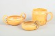 Kähler, DenmarkSet with creamer, sugar bowl and mug, 1930s.Three pieces in the classic warm ...