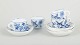 Meissen – “Blue Onion”Set of four demitasse cups with saucers, late 19th ...
