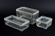 Set of three Wilhelm Wagenfeld “Kubus” glass boxes.Set of three rectangular clear-glass ...