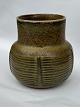 Royal Copenhagen stoneware vase. Designed by Gerd Bøgelund Covered with a green solfatara glaze. ...