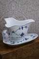 Royal Copenhagen Blue Fluted Plain triangular sauce pot on solid saucer.1/203. 
1898-1923...