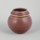RörstrandVase, mid-20th century.Spherical stoneware vase with subtle vertical ribbing and a ...