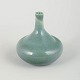 Erik H., SwedenUnique miniature vase, 1970s.Small thrown stoneware vase with a rounded body ...