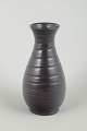 Bo Fajans, SwedenVase, 1940s.Hand-thrown pottery vase with a dark brown glaze and pronounced ...