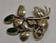 Karin Borup, Copenhagen - Birkerød (2010 - ): Brooch in sterling silver. With two green stones. ...