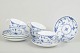 Royal CopenhagenSet of five cups and saucers, 1920s.Classic Blue Fluted Half Lace cups in ...