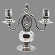 Georg Jensen; 
Solid two-armed 
candelabra in 
sterling 
silver, 
decorated with 
grapes and ...