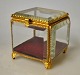 Jewelry box, France, circa 1900. With faceted glass and decorated brass frames and four legs. 8 ...