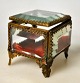 Jewelry box circa 1900. France. With faceted glass and decorated brass frames and four legs. 6.5 ...
