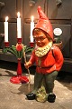 Large terracotta gnome from the 50s with fine painting, backpack and wooden cane. Height: 49.5cm.