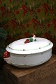 Antique, Swedish oval manor house Christmas tureen in faience with a colored gnome lying on ...