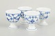 Royal Copenhagen Blue Fluted Plain egg cups, set of 4, 1920s.Set of four classic egg cups in ...