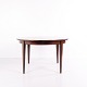 Round dining table model 55 in rosewood, designed by Gunni Omann for Omann Jun Møbelfabrik. With ...