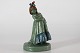 P. Ipsens EnkeFigurine decorated with green glaze +red and blue "Hennes nåd" no. ...