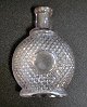 Flask in fluted glass, 19th century. H: 15 cm.