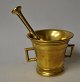 Danish brass mortar with pestle, 19th century. Mortar with two handles. Height: 9 cm. Length ...