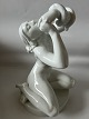 Dahl Jensen Elegant and dynamic porcelain figurine, with a motif of Eve with the snake. The ...