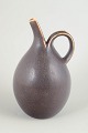 Saxbo, Denmark, large jug, mid-20th century.Rare and large jug in stoneware with a ...