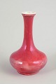 Kähler, vase.Slim-necked vase with a rounded body and a rare deep red glaze showing subtle ...