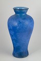 European art glass, floor vase.Large free-blown floor vase in blue art glass with a dynamic, ...
